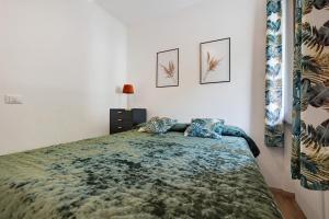 a bedroom with a large bed with two pillows at di Pastei 13 in Ledro +21 photos