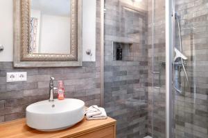 a bathroom with a sink and a shower at Panorama Apartment Todtmoos in Todtmoos +19 photos