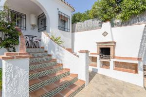 a set of stairs leading up to a house at Cortijo Encarni in Frigiliana