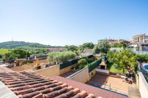 a view from the roof of a building at another day in paradise in Calafell