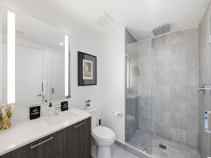 a bathroom with a toilet and a shower at Brickell Bay View in Miami +24 photos