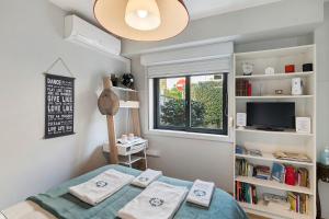 a small room with a bed and a window at Annex Bedroom - Oporto Garden in Porto