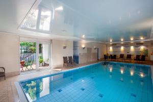 a large swimming pool in a house at Haus Schönblick in Willingen
