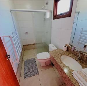 a bathroom with a sink and a toilet in it at hotel fazenda ctk in Santa Cruz do Sul +30 photos