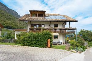 a house with solar panels on the roof at Harmony room in Piano