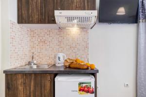 a kitchen with a sink and a counter top at Nikiana Club - Studio 6 in Nikiana