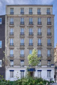 an apartment building in the city of lyon at Hôtel de Bellevue Paris Gare du Nord in Paris