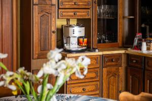 a coffee maker sitting on a counter in a kitchen at Salento Home in Cursi