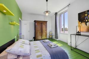 a bedroom with a large bed in a room at Chambres D'hôtes La Baritaudière in La Réorthe