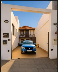 a car parked in the garage of a house at Casa Miranda 3 in Igueste