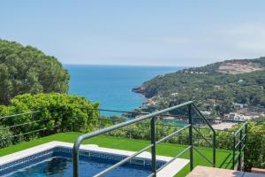 a balcony with a view of the ocean at Racó 72 in Begur