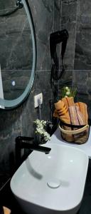 a bathroom with a white sink and a mirror at Blue Sea in Herceg-Novi +41 photos