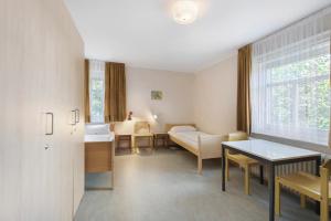 a living room with a couch and a table at Ferienheim Eisenbach in Eisenbach