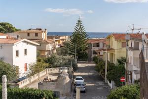 a view of a street in a town with buildings at Holiday vista mare in Cala Gonone
