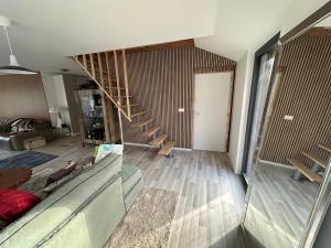 a view of a living room with a staircase at Villa julia in Cros