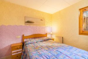 Llit o llits en una habitació de El Case
