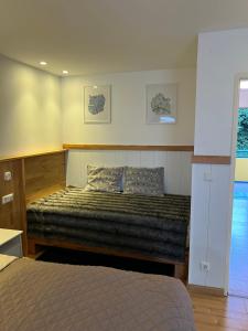 a bedroom with a bed in a room at Apartments Neckarsulm in Neckarsulm