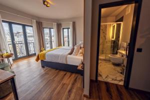 a hotel room with a bed and a bathroom at Residency NO7 in Berlin +32 photos