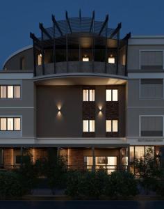 an image of a building with its lights on at Hotel Botika in Kraljevo