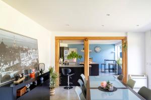 a living room with a table and a dining room at Chambre Chene in Mauléon-dʼArmagnac +12 photos