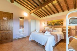 a bedroom with two beds in a room at Masseria del bosco Poderuccio in Chianciano Terme +75 photos