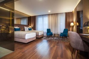 SAINT TEN Boutique Hotel, Small Luxury Hotels客房内的一张或多张床位