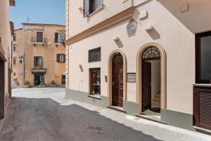 a street in an old town with buildings at Lubrense Signature Suites in Massa Lubrense