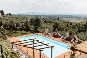 a swimming pool in a villa with a view at Fattoria di Cinciano in Poggibonsi