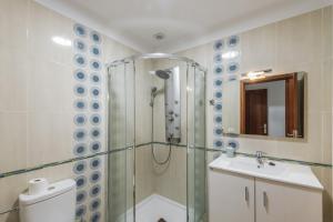 a bathroom with a shower and a sink at Lujan 6f Entre Sueños Y Realidad in Puntallana +12 photos
