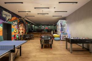 a ping pong room with ping pong tables at Resort Aurum in Černý Dŭl