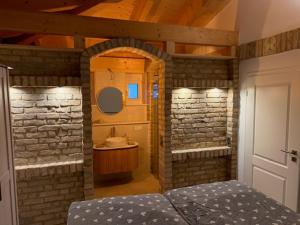 a room with a bathroom with a sink at Villa Toscana in Teltow