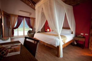 Postel nebo postele na pokoji v ubytování Cloudenjoy B&B