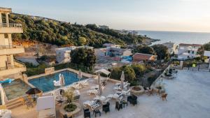an aerial view of a resort with a swimming pool at Aurora Apartments with Pool in Bar