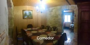 a dining room with a table in a building at Casa Bohemio - Tabarca in Tabarca