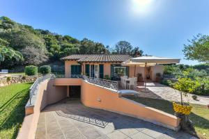 a villa with a view of the garden at Elba Offsite Villa in Capoliveri