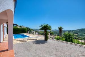 a view of a villa with a swimming pool at Villa Romantica by Easy Brava in Calonge