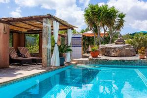 a pool with a gazebo and a house at Apartment Adults Only - Mallorca in Manacor
