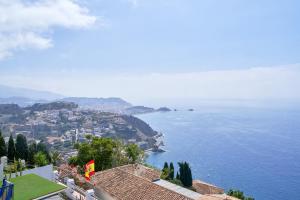 a view of a city and the ocean at Atalaya in Almuñécar