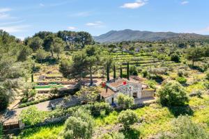 an aerial view of a farmhouse in a field at Toscana in Benissa
