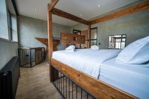 a bedroom with a large bed in a room at LV8 Chesterfield in Chesterfield