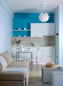 Kuchyň nebo kuchyňský kout v ubytování Aeolis Apartments & Studios