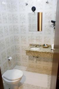 Koupelna v ubytování Hotel Abib + 15 fotografií