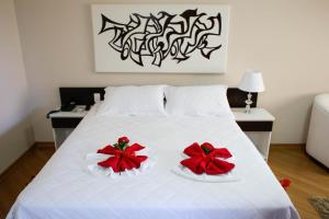 Postel nebo postele na pokoji v ubytování Hotel Abib