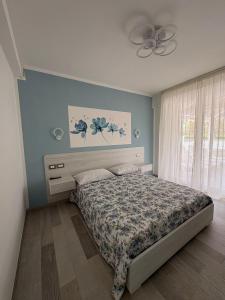 a bedroom with a bed and a ceiling fan at Tenuta il Bandito in Montesano Scalo +36 photos