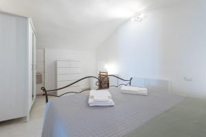Llit o llits en una habitació de La Greca 59