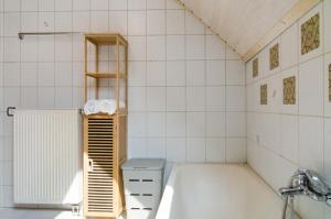 a small bathroom with a toilet and a sink at Jogis Paradies In Ruhiger Lage in Stockach +35 photos