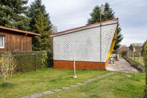 a building with a basketball hoop on the side of it at Haus am Candelaber in Altenbergen