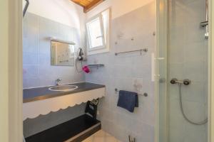 a bathroom with a sink and a shower at Villa Cap mer 17 in Saint-Palais-sur-Mer +19 photos