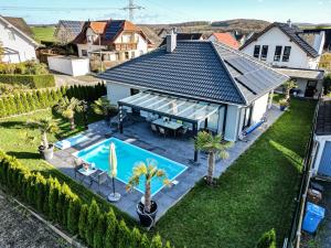 an overhead view of a house with a swimming pool at Ferien Marx in Oberbrechen