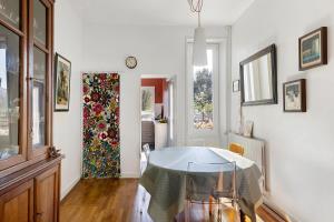 a dining room with a table and a window at Quartier De La Madeleine in Angers